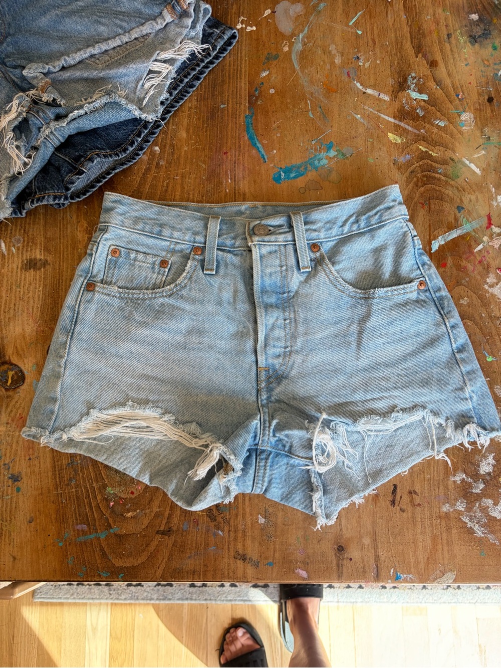 Levi’s High-Rise Light Blue Distressed Denim Shorts